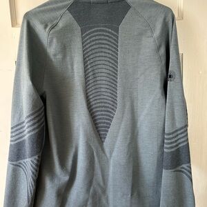 Women's NWOT Smartwool lightweight teal zip up activewear jacket w pockets.